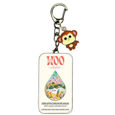 Monkey charm on pineapple oil balm tag