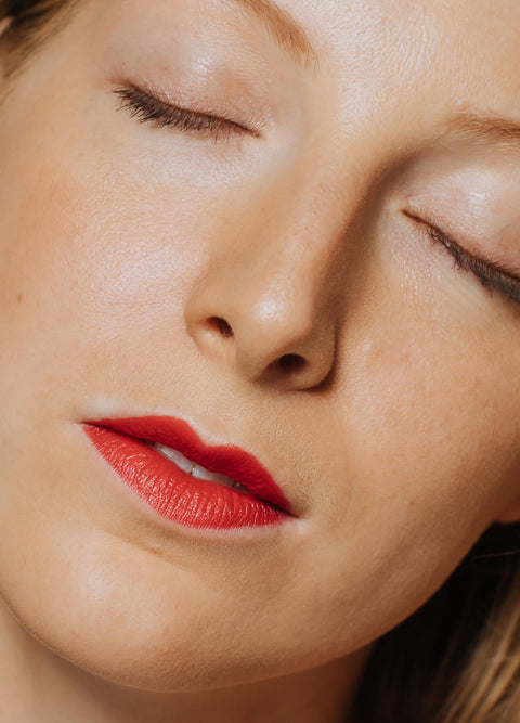 vegan cruelty free lipstick lip crayon +caption_Laura is wearing Coy #shade_Coy_|_Warm_Poppy_Red